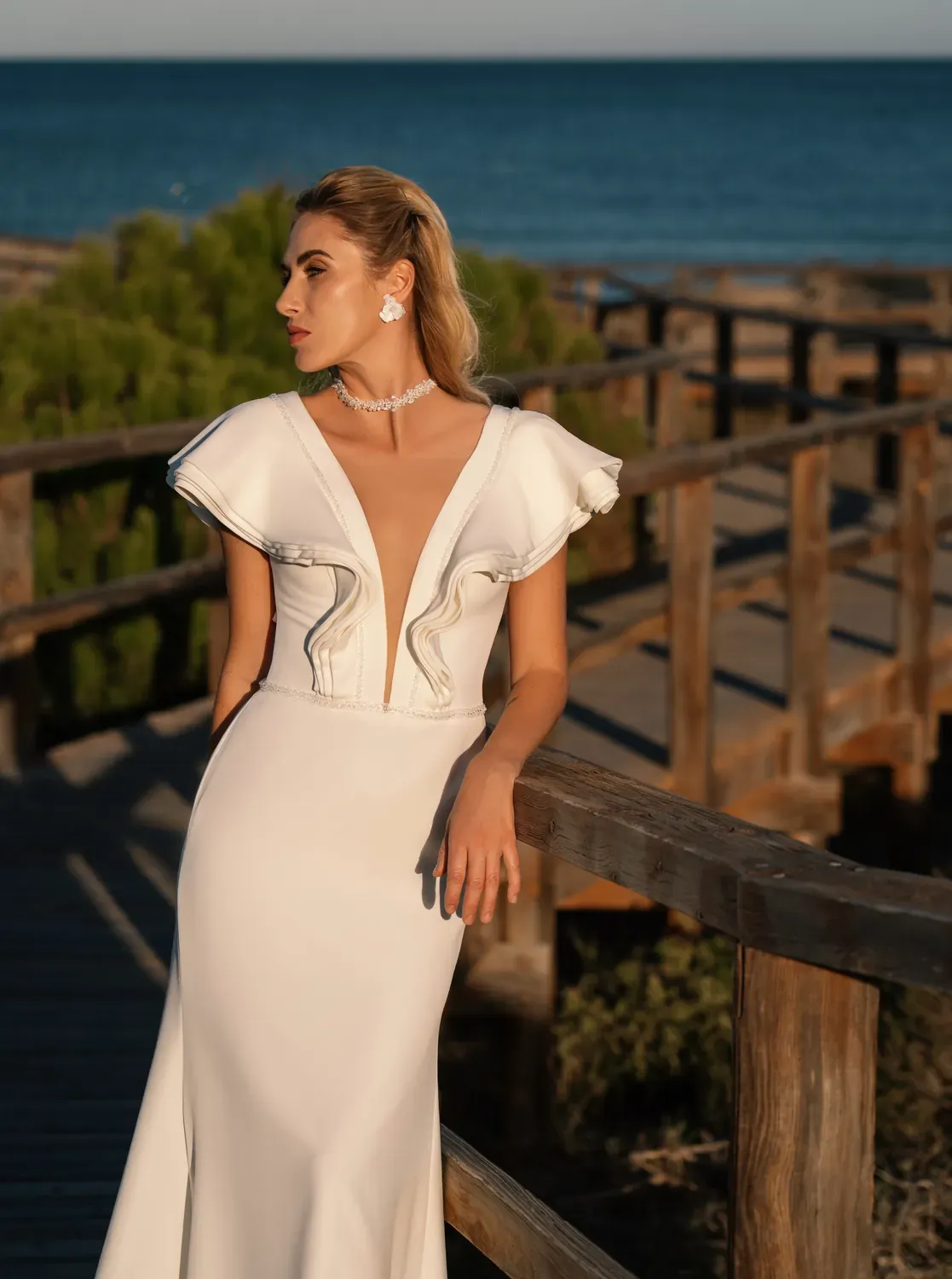 Detalle del vestido Marea al atardecer junto al mar